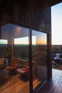 a living room with a view of the city at Black Diamond Villa in Mosfellsbær +114 photos