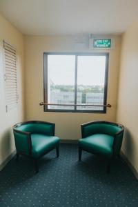 Posezení v ubytování Nonthaburi Palace Hotel