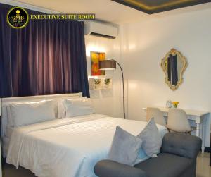 Postel nebo postele na pokoji v ubytování Gmb-Arte' Hotel