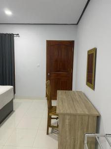 Postel nebo postele na pokoji v ubytování Taman Ratih Guest House