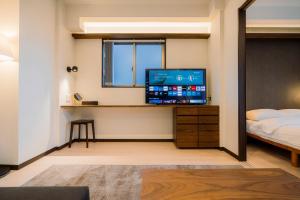 Katil atau katil-katil dalam bilik di Apartment Hotel MODISH Gion