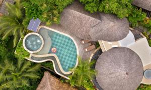 Bazén v ubytování The Alena Resort a Pramana Experience nebo v jeho okolí
