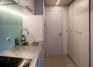 Kuchyň nebo kuchyňský kout v ubytování Tiny house Les Nomades