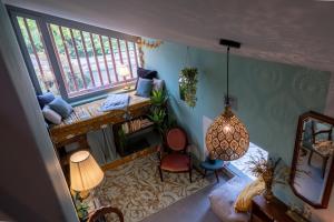 Postel nebo postele na pokoji v ubytování Tiny house Les Nomades
