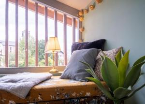 Postel nebo postele na pokoji v ubytování Tiny house Les Nomades