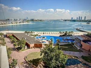 an aerial view of a water park next to a river at Fantastic flat in TiaraResidence in Dubai