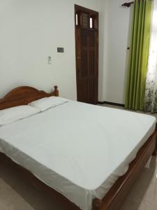 Postel nebo postele na pokoji v ubytování Whits villa 24