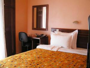 Letto o letti in una camera di Hotel Royal