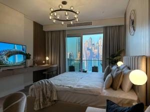 Breathtaking view studio – Address Dubai Marina客房内的一张或多张床位