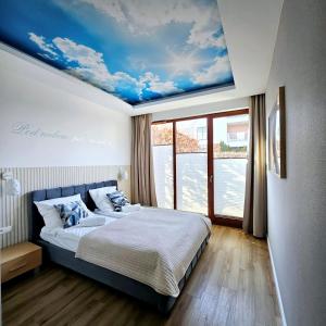 Posteľ alebo postele v izbe v ubytovaní Blue Atlantis-Nowe Orłowo
