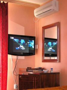 TV o dispositivi per l'intrattenimento presso Hotel Royal