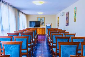 TV a/nebo společenská místnost v ubytování Hotel Ipomea Club