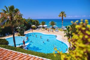 Bazén v ubytování Hotel Ipomea Club nebo v jeho okolí