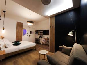 Armony Luxury Suites客房内的一张或多张床位