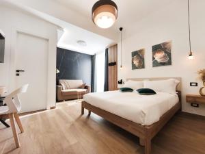 Armony Luxury Suites客房内的一张或多张床位
