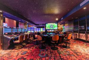 a casino with a bunch of slot machines at Beatrix Lux Hotel in Budva