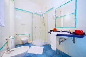 Koupelna v ubytování Hotel Ipomea Club