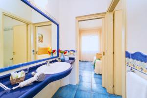 Posezení v ubytování Hotel Ipomea Club