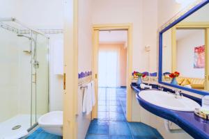 Koupelna v ubytování Hotel Ipomea Club