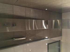 a kitchen with a stainless steel kitchen hood at Gallo in Nice