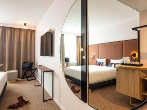 Posteľ alebo postele v izbe v ubytovaní Mercure Dunkerque Centre Gare