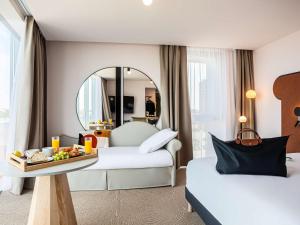 Posteľ alebo postele v izbe v ubytovaní Mercure Dunkerque Centre Gare