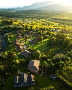 an aerial view of a park with houses and trees at Mogodi Lodge in Graskop +24 photos