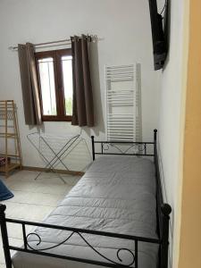 Letto o letti in una camera di L'atmosfera
