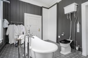 Koupelna v ubytování Dale-Gudbrands Gard by Frich`s + 27 fotografií