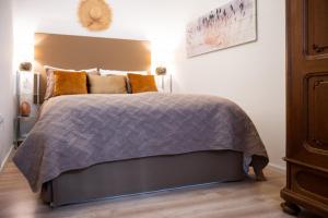 Posteľ alebo postele v izbe v ubytovaní Cozy Apartment Steyr Mitte, ruhig, Parkplatz, Terasse, 2 Schlafzimmer, WLAN