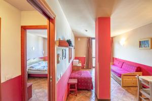 A bed or beds in a room at Borgo Stalle Residence