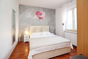 Postel nebo postele na pokoji v ubytování Apartment Plese