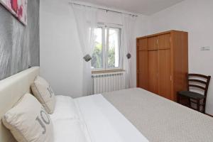 Postel nebo postele na pokoji v ubytování Apartment Plese