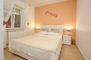 Postel nebo postele na pokoji v ubytování Apartment Plese