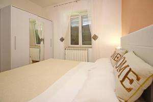 Posteľ alebo postele v izbe v ubytovaní Apartment Plese