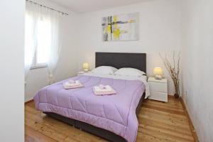Postel nebo postele na pokoji v ubytování Apartment Plese