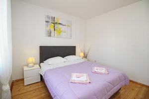 Postel nebo postele na pokoji v ubytování Apartment Plese