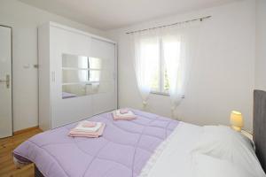 Postel nebo postele na pokoji v ubytování Apartment Plese