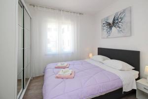 Postel nebo postele na pokoji v ubytování Apartment Plese