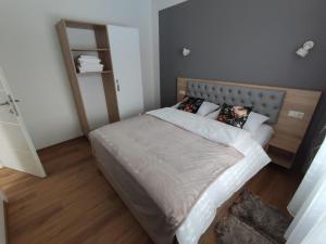 Ένα ή περισσότερα κρεβάτια σε δωμάτιο στο Apartments33Mario