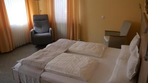 Postel nebo postele na pokoji v ubytování Hotel Gewürzmühle