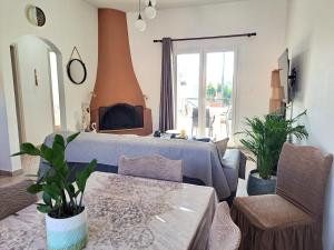 Postel nebo postele na pokoji v ubytování Guest House Alepou Leros