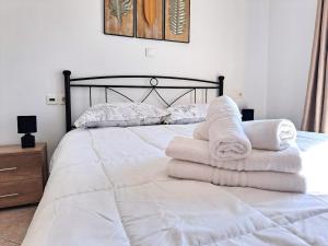Postel nebo postele na pokoji v ubytování Guest House Alepou Leros