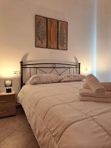 Postel nebo postele na pokoji v ubytování Guest House Alepou Leros