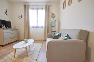 Μια τηλεόραση ή/και κέντρο ψυχαγωγίας στο Coquet T2 pres des plages