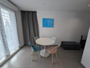 Posezení v ubytování Appartement Fréjus + 6 fotografií