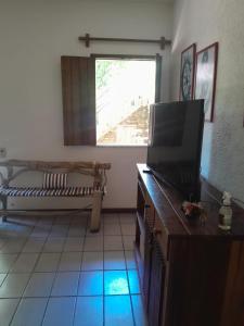 Et tv og/eller underholdning på Casa Aconchegante Porto Segur