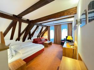 Postel nebo postele na pokoji v ubytování Hotel Haimerlhof