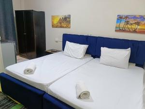 Llit o llits en una habitació de New Pyramids hostel