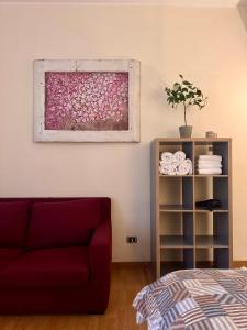 A seating area at Roma Da Noi Suite